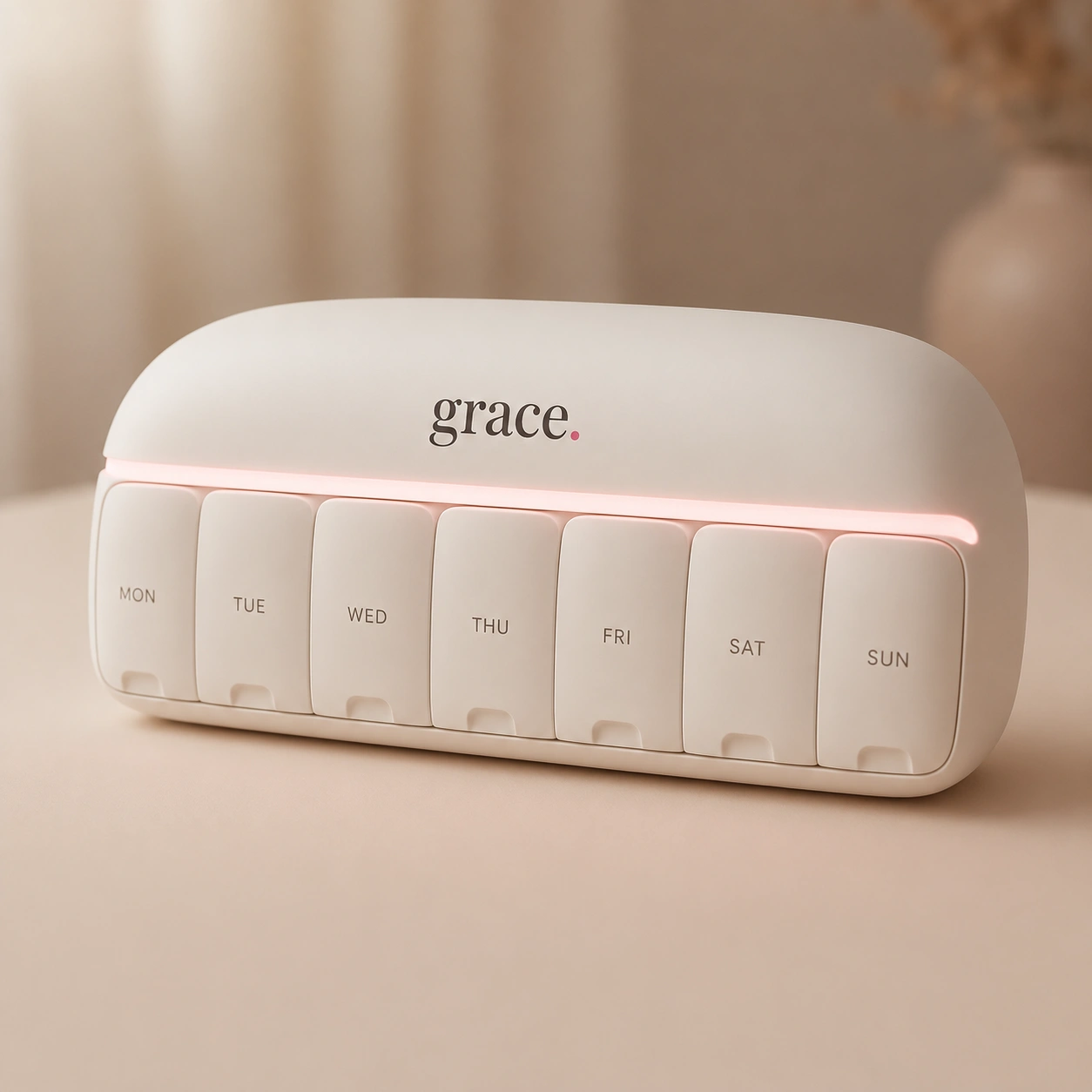 posy — grace smart pillbox with seven daily compartments and warm pink halo